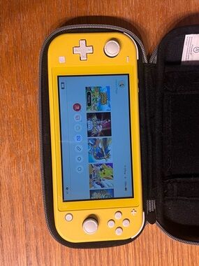 Nintendo Switch Lite Yellow Handheld Console with animal crossing installed